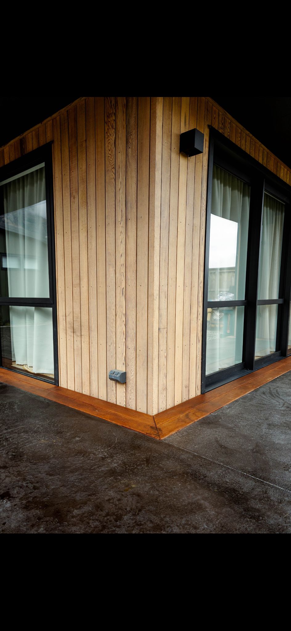 Outdoor deck boards aligned level with door threshold